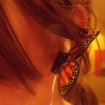 sluchawki z motylkiem na uszach